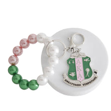 Load image into Gallery viewer, Pink Green Pearl Shield Keychain
