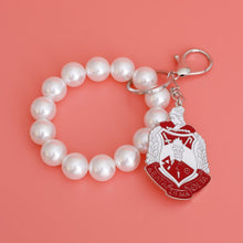 Load image into Gallery viewer, White Red Shield Pearl Keychain
