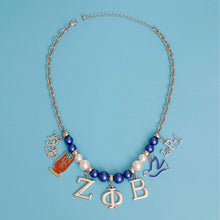 Load image into Gallery viewer, Blue White Pearl Zeta Necklace
