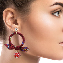 Load image into Gallery viewer, Burgundy Wrapped Ring Earrings Featuring Red Glitter Drop Ball
